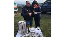 Jo samples the oysters with Patrice