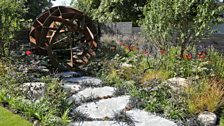 Inspired by the Belgian sculptor William Roobrouck – a 2.5m diameter corten steel sphere represents a fallen meteor.