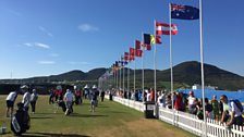 Golfers warm up on the driving range