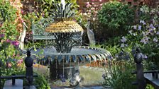 The central water feature is based on Charleston’s famous Pineapple fountain