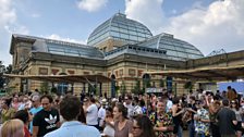 Revellers against the backdrop of Ally Pally