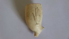 Piece of Clay Pipe Bowl Found at Excavation Site.