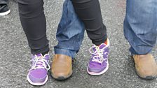 Jo and Hugo fight to see who jeans are more wet with the weather