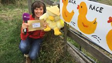 The clue was down by the water because the village's duck race would be taking place there later