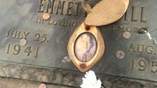 Mamie Till's locket photograph of her murdered son on his grave