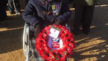 Margaret in her chair with her poppy wreath