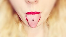 A modern pierced tongue