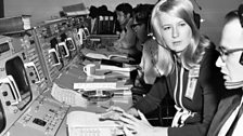 Computer engineer 'Poppy' speaks to a colleague in Nasa's Mission Control