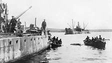 German Sailors abandoning ship as they scuttled their warships