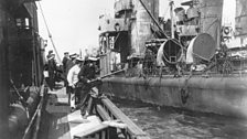 A British boarding party alongside a German Destroyer