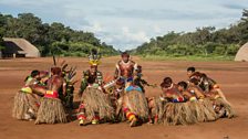 Akari leads a Wauja music and dance ritual in the centre of the village.