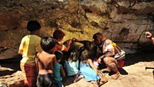 Wauja Elders show the Kamukuwaka engravings to a new generation.