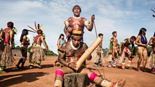 Akari leads a Wauja music and dance ritual in the centre of the village.