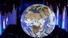 The public gaze at Luke Jerram's earth artwork Gaia, at the Wills Memorial Building in Bristol