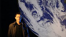 Artist Luke Jerram with his replica earth artwork, Gaia