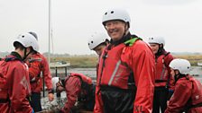 Derek joins in a raft building and sailing exercise at Pensarn Harbour