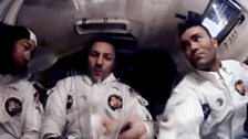 L to R - Jim Lovell, Jack Swigert and Fred Haise prepare for re-entry through Earth's atmosphere as the mission nears its end.