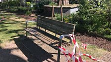 “In Newington Green, park benches have been bound in a stripy hazard tape like a crime scene.”