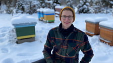 Paulius Chockevičius with his hives in the deep midwinter