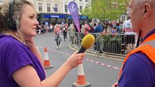 More runners appear cheered on by the crowds as Rachel and Simon try to solve the next clue...