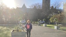 Amy in the morning sunshine near Lincoln Cathedral about to have a mystery talk......