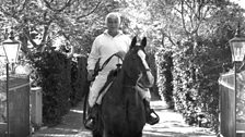 Elmer Bernstein riding Billsox at home in Santa Barbara, California (1995)