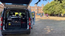 Our broadcast vehicle Merlin in the shade....