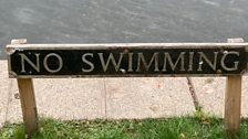 It has a very posh 'no swimming' sign.....