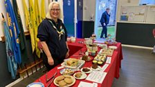 Inside the Scout Hut you could pick up a map for the scarecrow trail and buy a cake from Julie...