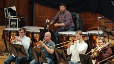 Timpanist Mark McDonald with the trombones and trumpets of the Ulster Orchestra