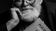 Michael Longley holding a W.R. Rodgers collection