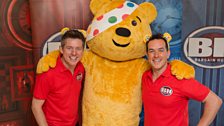 Reds Dick and Dom with Pudsey Bear