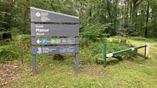 Sign to Manor Wood