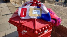 The box had been specially adorned with an England scarf