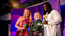 Annette Hughes receiving her award on stage