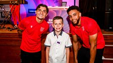 Grimsby Town players pose with a young award nominee