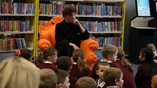 Blue Peter presenter Joel M with children from Cookstown Primary School during his visit to Cookstown Library on Wednesday.