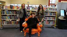 Blue Peter's Joel M with Bernie McCann and Kendra Reynolds from Libraries NI at Cookstown Library on Love Your Library Day 2023