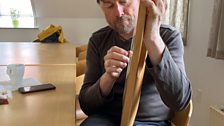 Playing a replica of an 8th century lyre