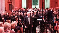 Neil Martin receives an ovation bow following the performance of his composition Undae Per Mundum