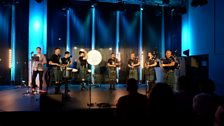 Mini Band from Inveraray and District Pipe Band performing onstage