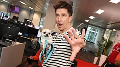 Russell Kane with his dog, Brian.