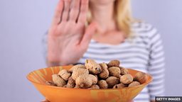 Can people be freed from peanut allergy? 人们能完全摆脱花生过敏吗?