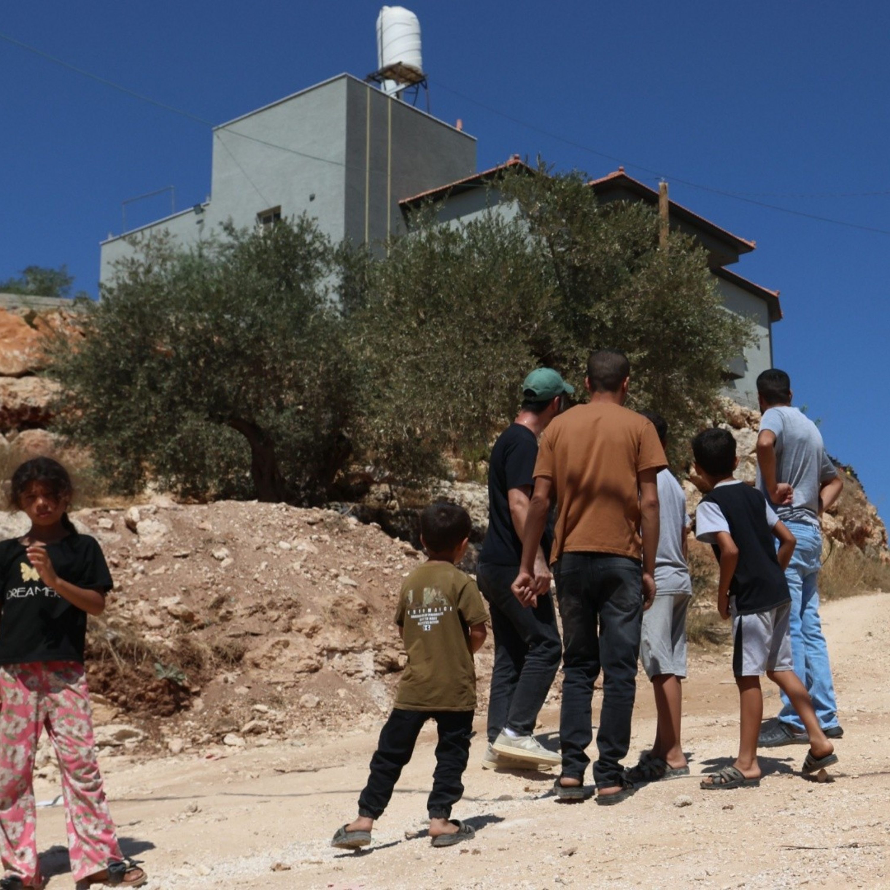 Israeli soldiers evacuate Palestinians besieged by settlers Episode cover