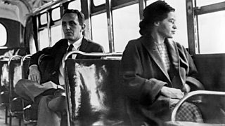 Rosa Parks seated on a bus