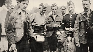 Highland troops in kilts pack their kits in World War One