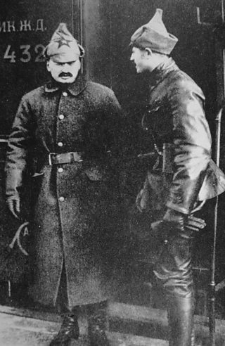 Trotsky and another Red Army officer beside a train
