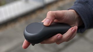 A hand held controller with trigger and thumb pad