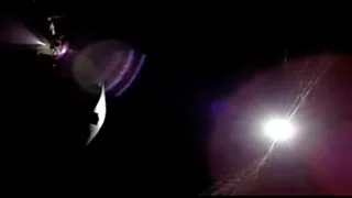 The Earth setting behind the Moon as seen from the Orion spacecraft