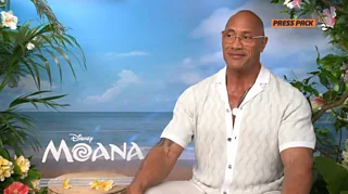 The Rock sitting against a Moana background.